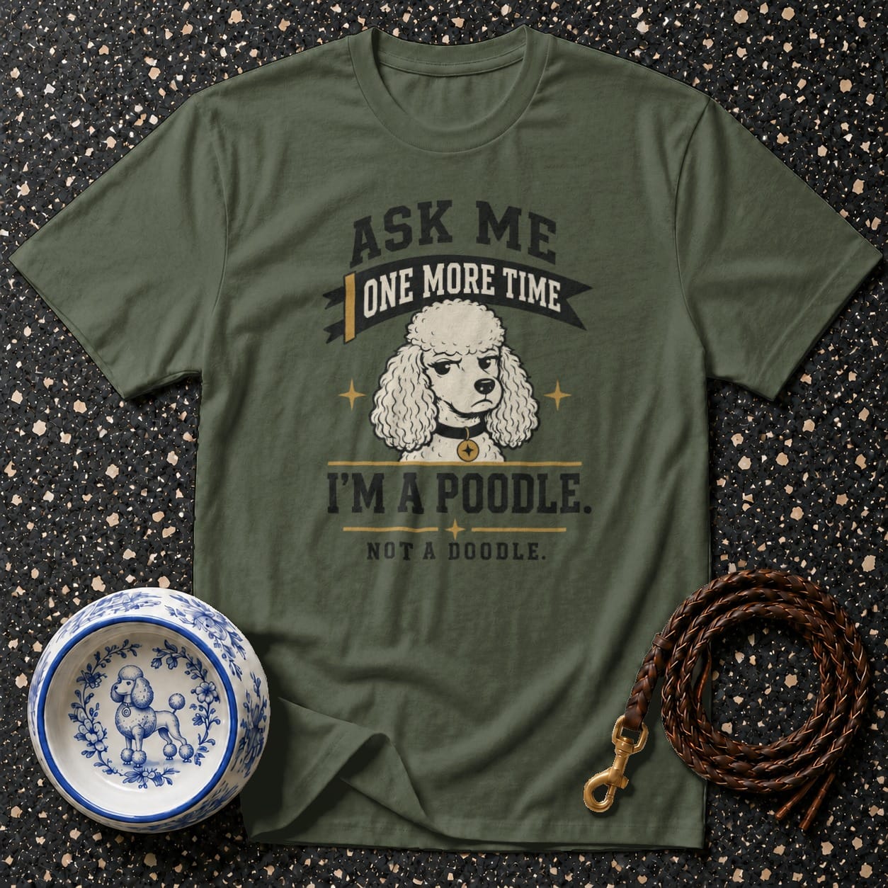 Olive t-shirt with a poodle graphic and text "Ask me one more time, I'm a poodle. Not a doodle."