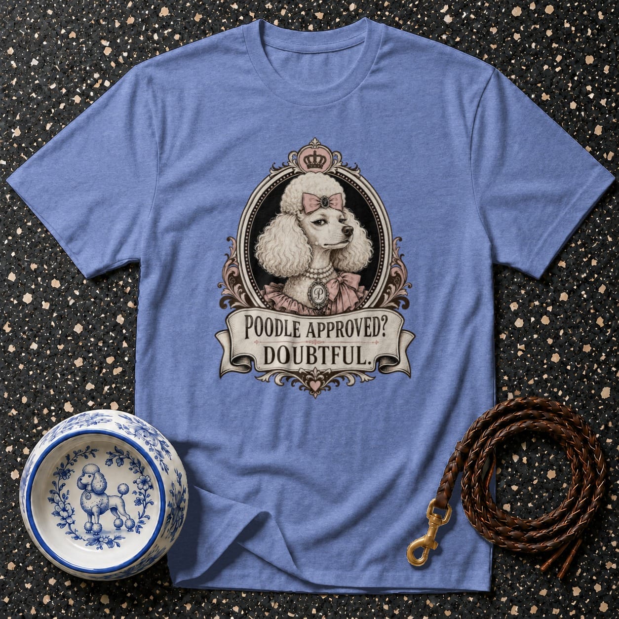 T-shirt with portrait of a poodle wearing a pink bow and crown, text reads "Poodle Approved? Doubtful."