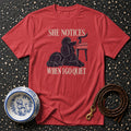 Red t-shirt with black poodle graphic and text "SHE NOTICES WHEN I GO QUIET".