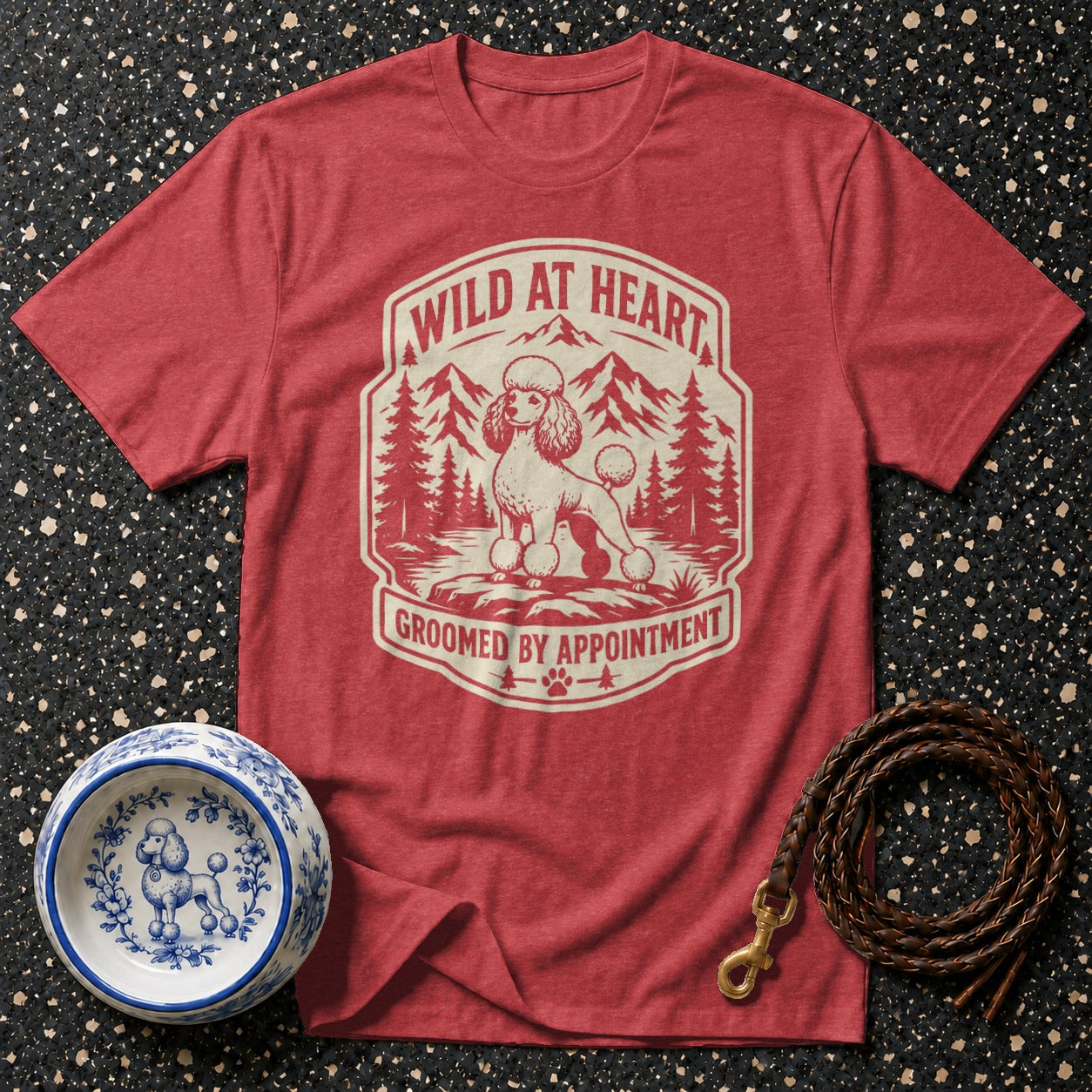 Red t-shirt with "WILD AT HEART GROOMED BY APPOINTMENT" and poodle graphic.