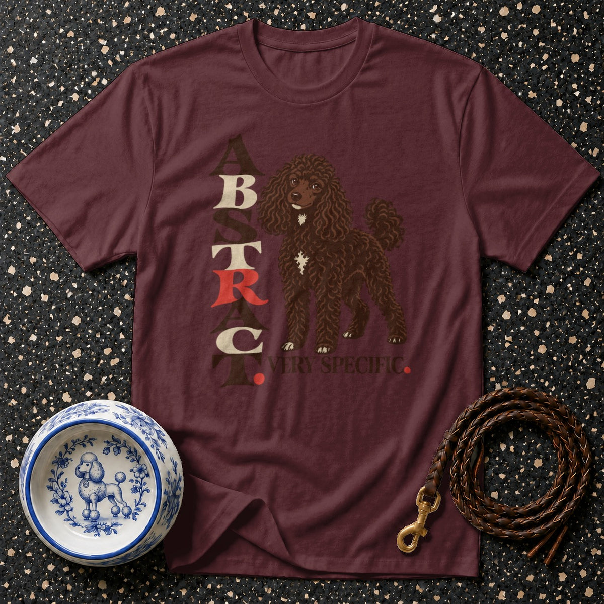 Maroon t-shirt with poodle illustration and "B T R C VERY SPECIFIC" text.