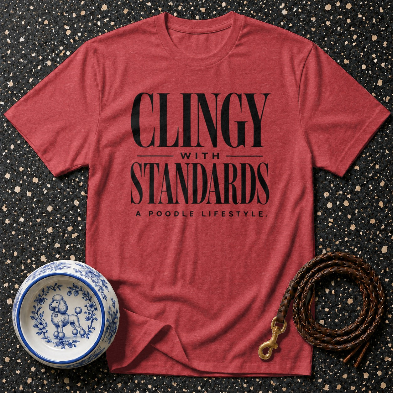 Red t-shirt with "Clingy With Standards A Poodle Lifestyle" text, dog bowl, and leash.