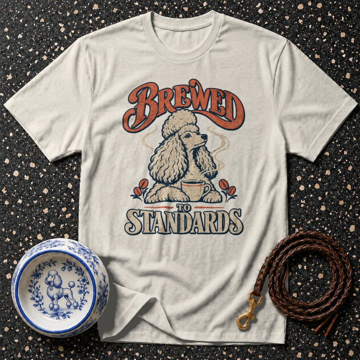 Cream t-shirt with a poodle, coffee cup, and text "BREWED TO STANDARDS".