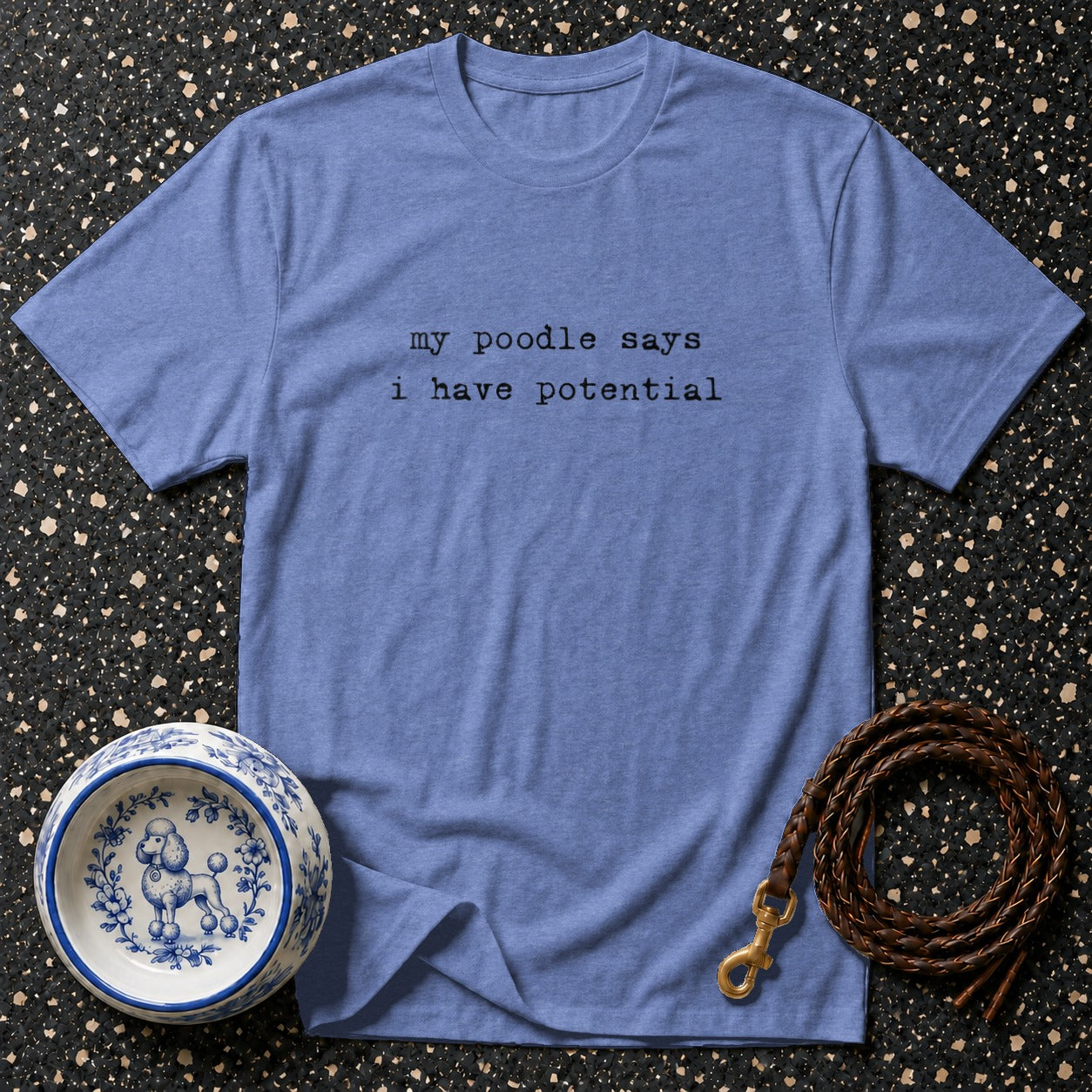 Blue t-shirt with text "my poodle says i have potential."