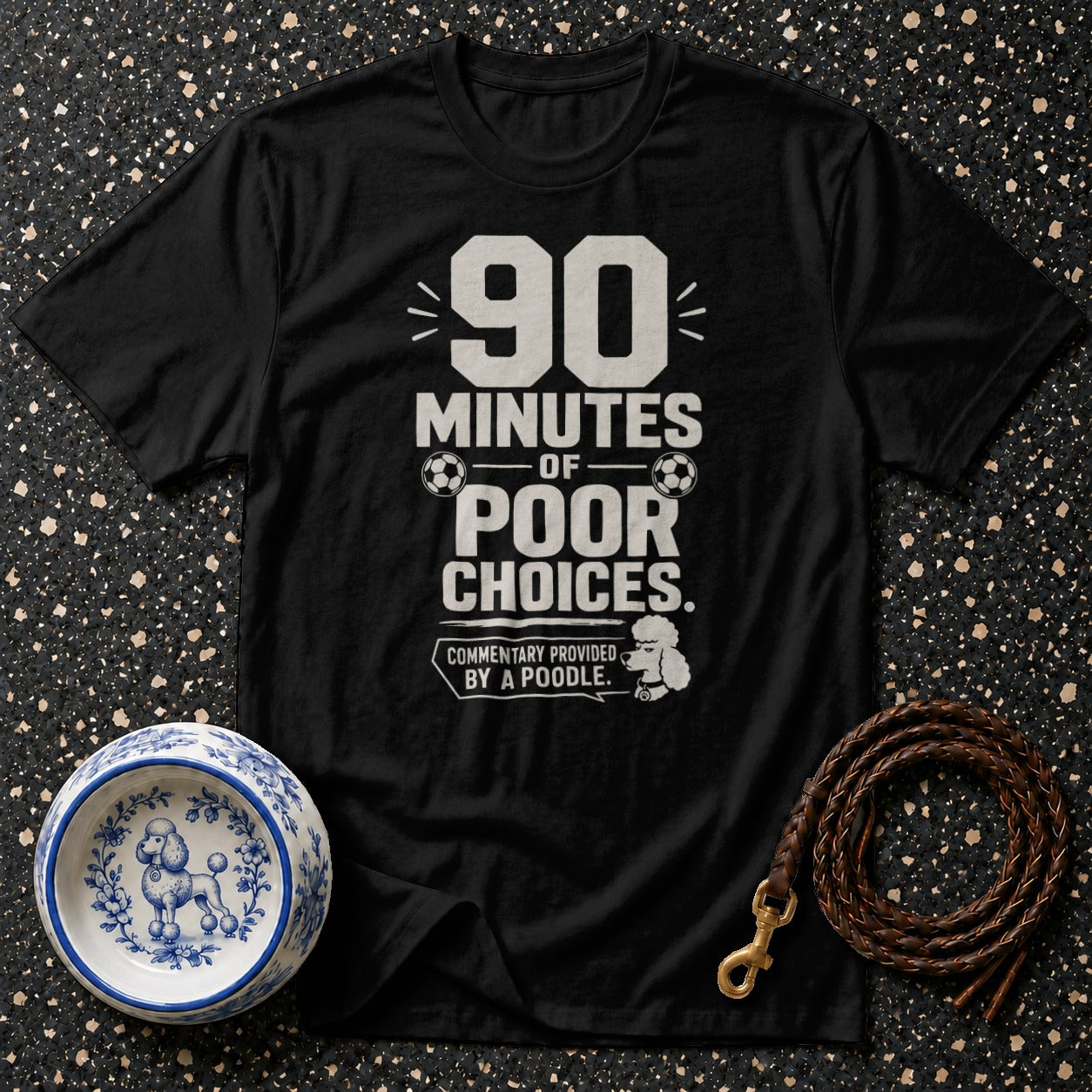 Black t-shirt with "90 minutes of poor choices. Commentary provided by a poodle." text.