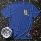 Blue t-shirt with embroidered poodle in car seat, ceramic dog bowl, leather leash.