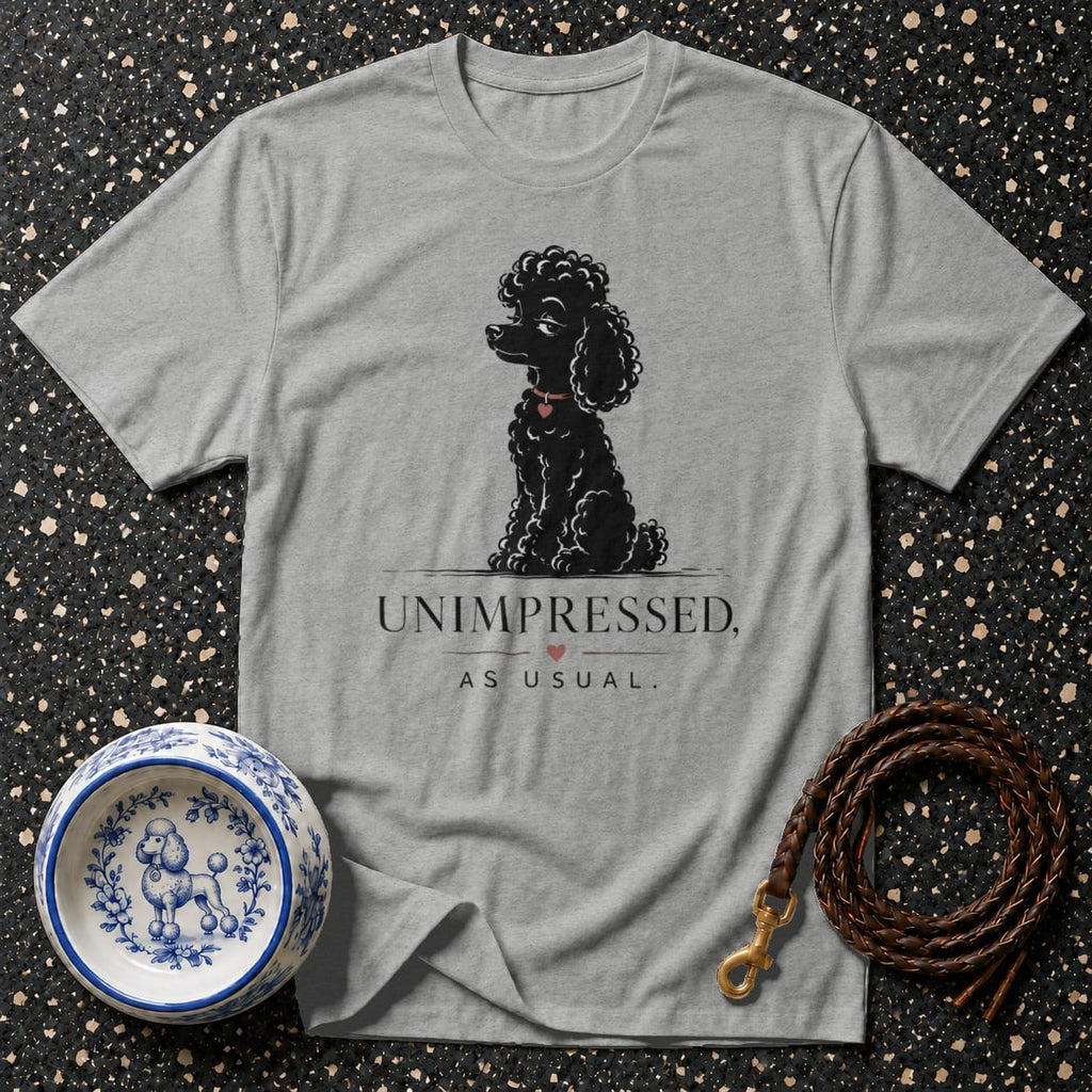 Grey t-shirt with black poodle illustration and "Unimpressed, As Usual." text.