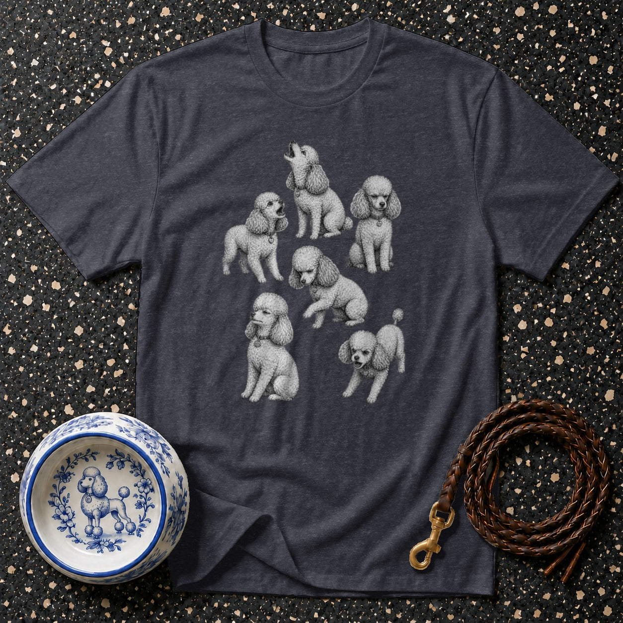 Dark gray t-shirt with a charcoal drawing of seven poodles in various poses.
