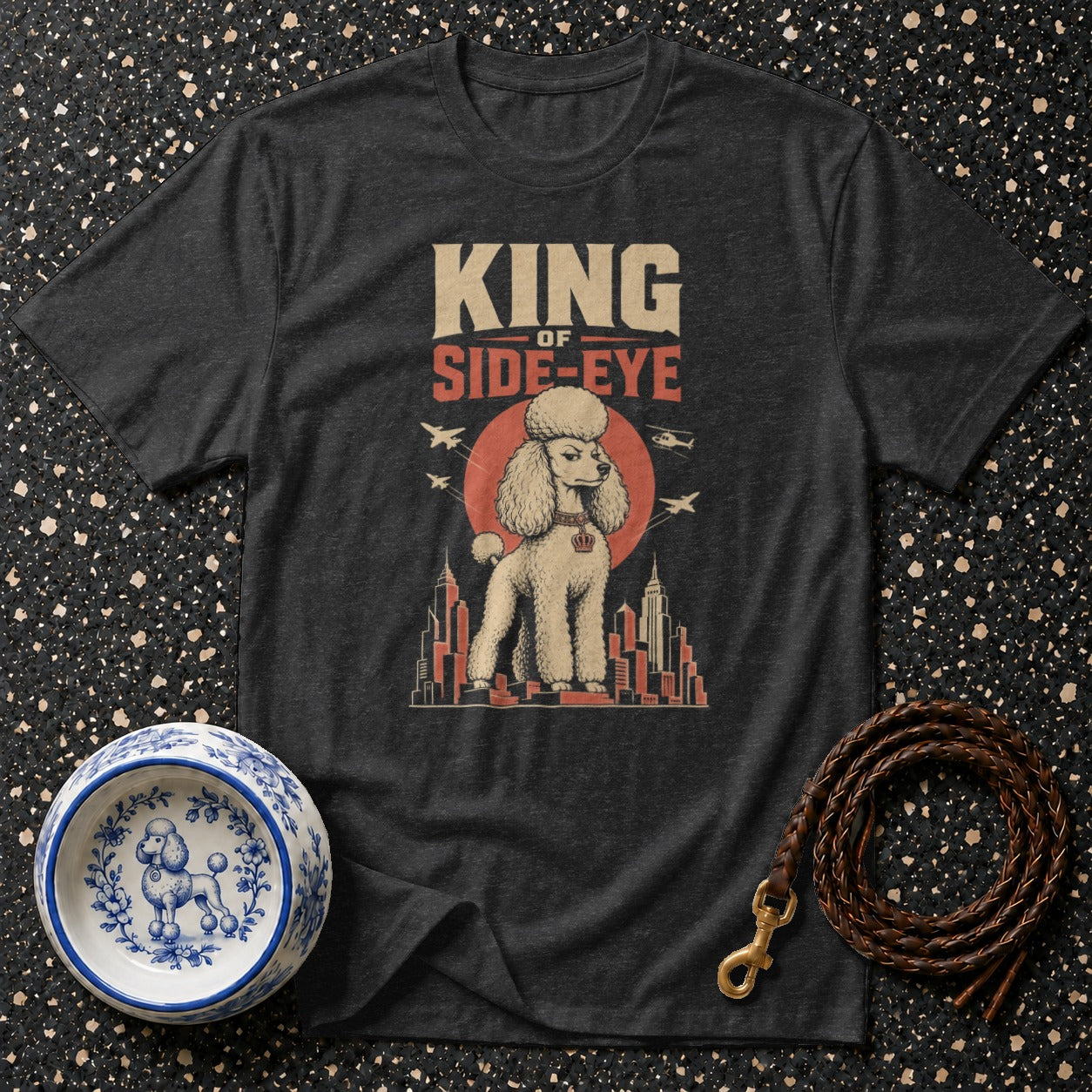 Dark grey t-shirt with "KING OF SIDE-EYE" text and a poodle graphic.