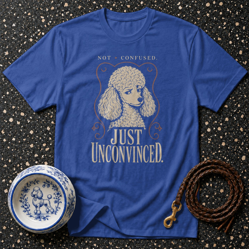 Blue t-shirt with poodle graphic and text "Not Confused. Just Unconvinced."