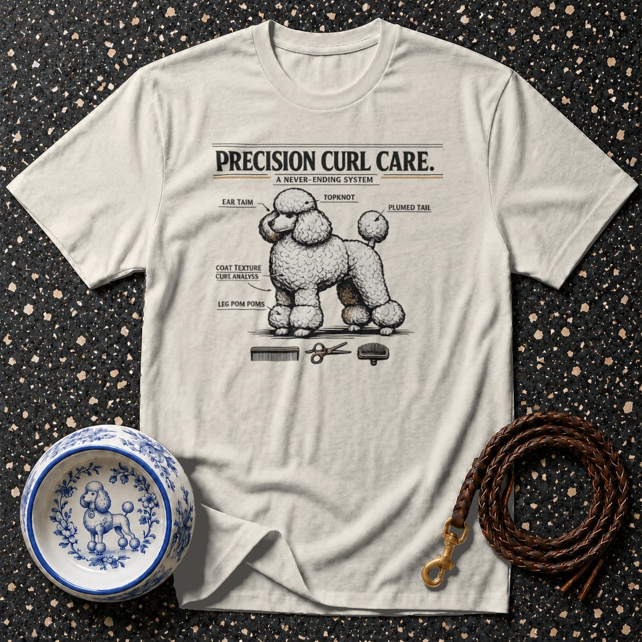 T-shirt with diagram of poodle grooming with "Precision Curl Care" text.