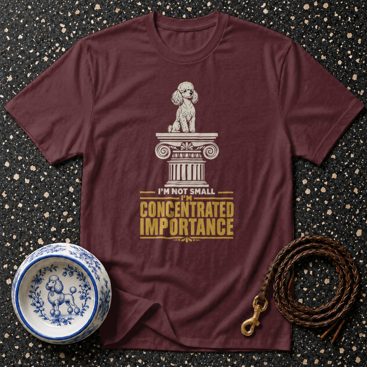 Maroon t-shirt with poodle graphic and "I'm Not Small, I'm Concentrated Importance" text.
