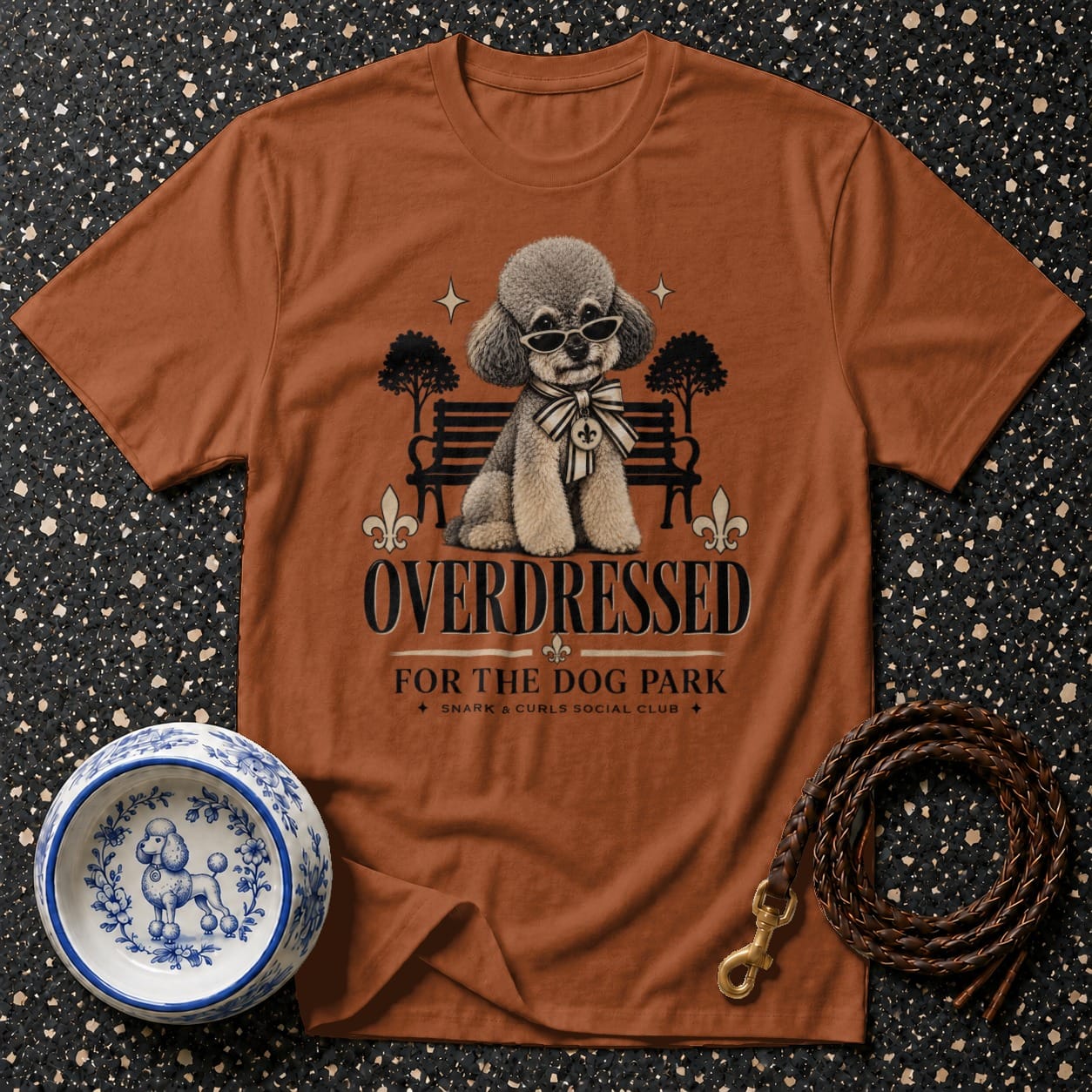 T-shirt with graphics of a poodle named "OVERDRESSED FOR THE DOG PARK".