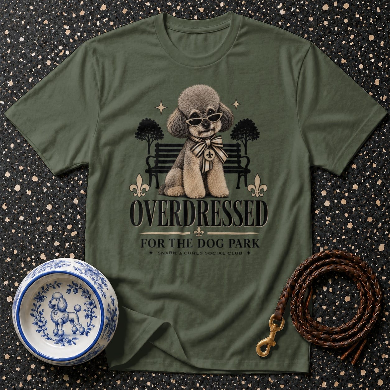Olive green t-shirt with "OVERDRESSED FOR THE DOG PARK" text and a poodle graphic.