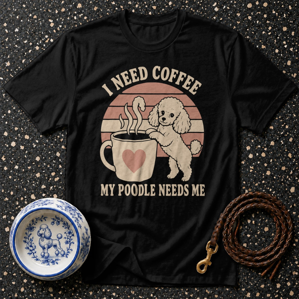 Black t-shirt with poodle and coffee mug graphic and text "I need coffee my poodle needs me".