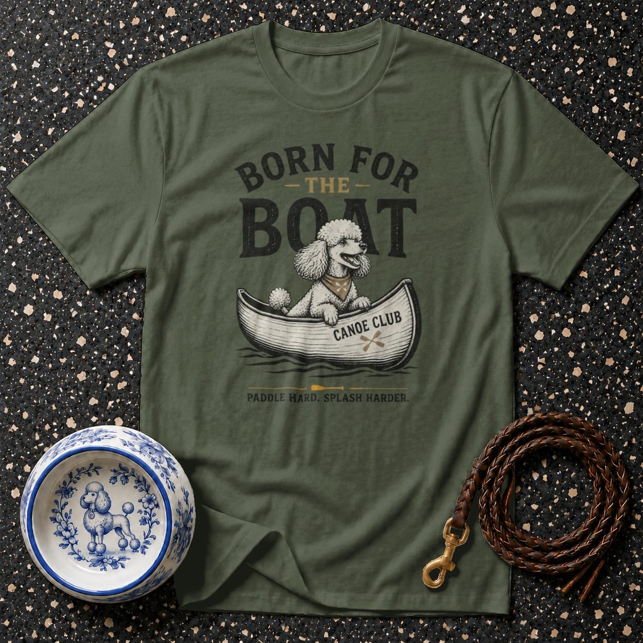 Green t-shirt with "Born for the Boat" graphic of a poodle in a canoe.