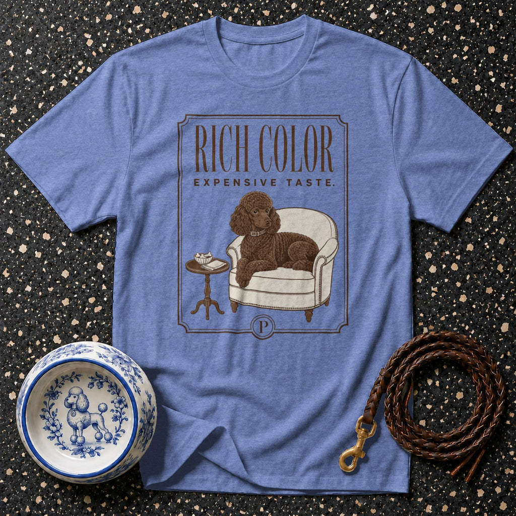 Blue t-shirt with brown poodle illustration; reads "RICH COLOR EXPENSIVE TASTE."