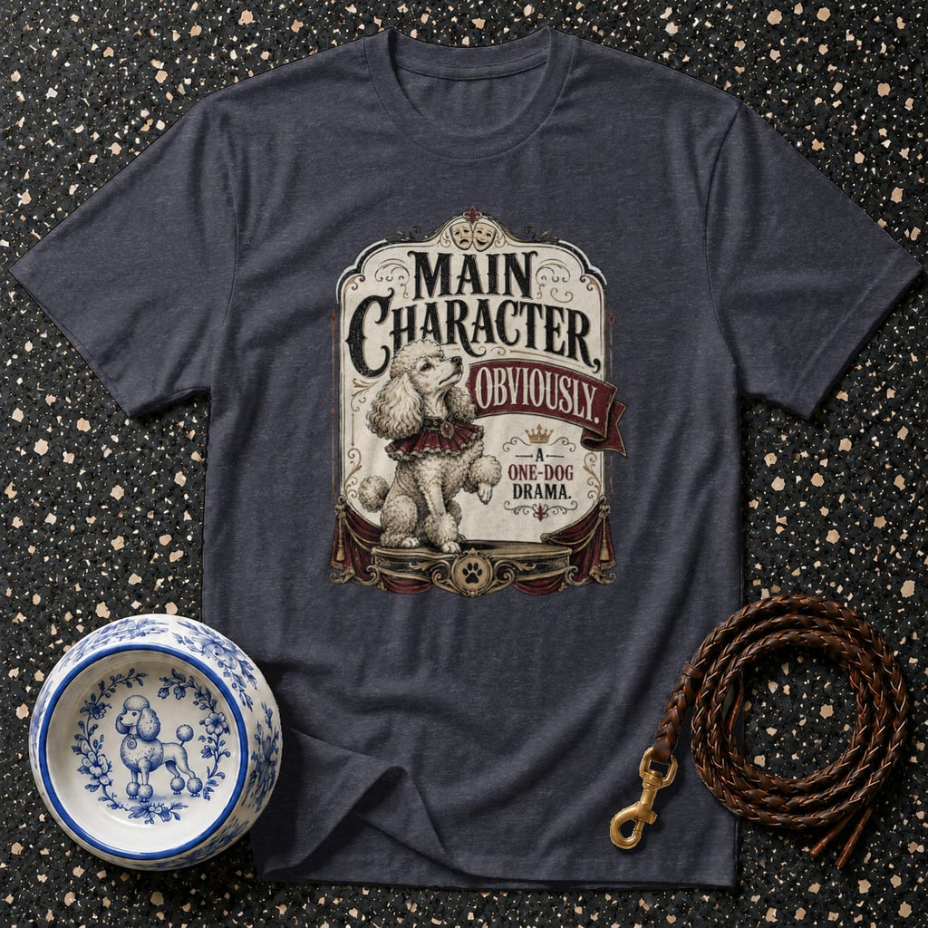 Dark grey t-shirt with a poodle graphic stating "Main Character, Obviously. One-Dog Drama."