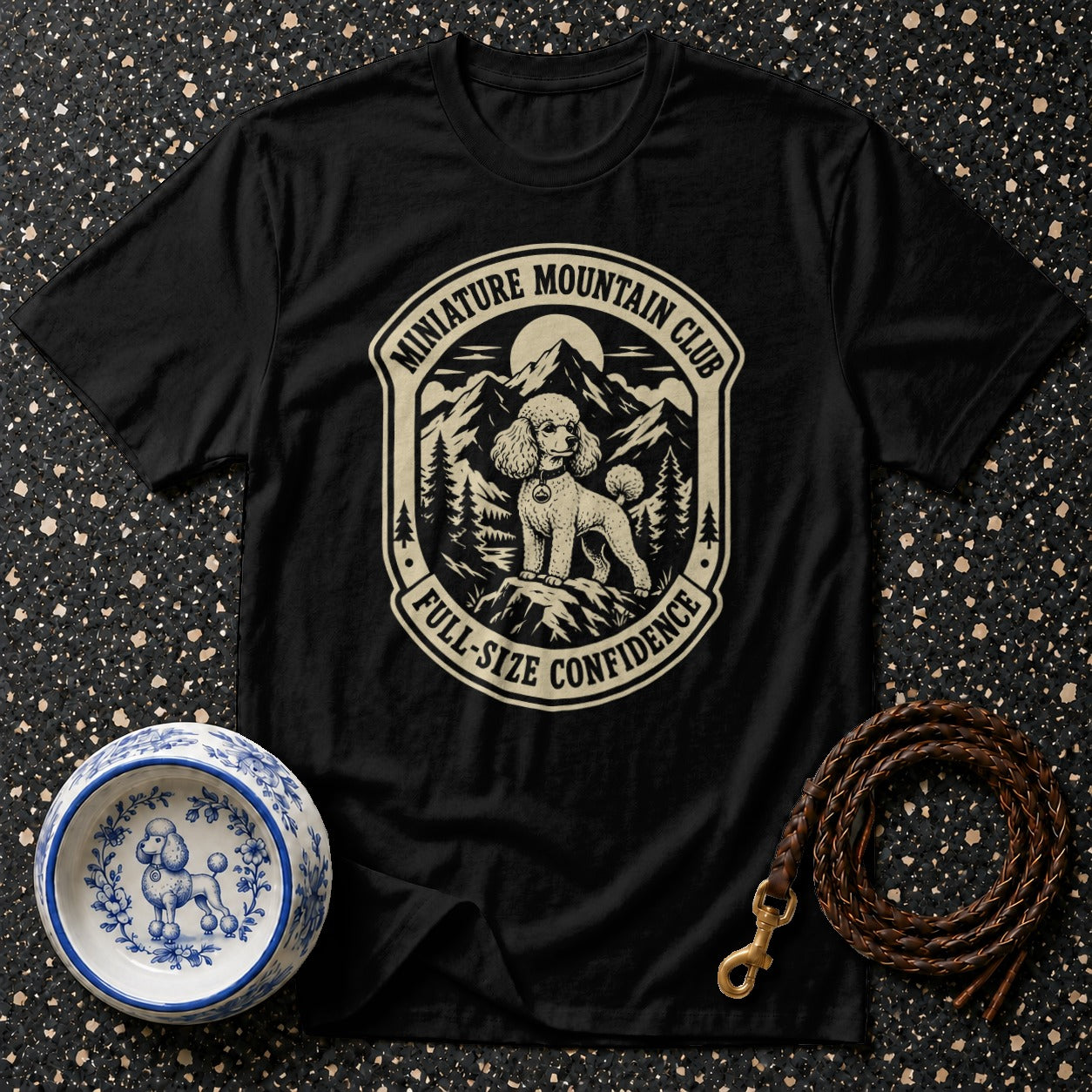 Black t-shirt with "Miniature Mountain Club" and poodle graphic.