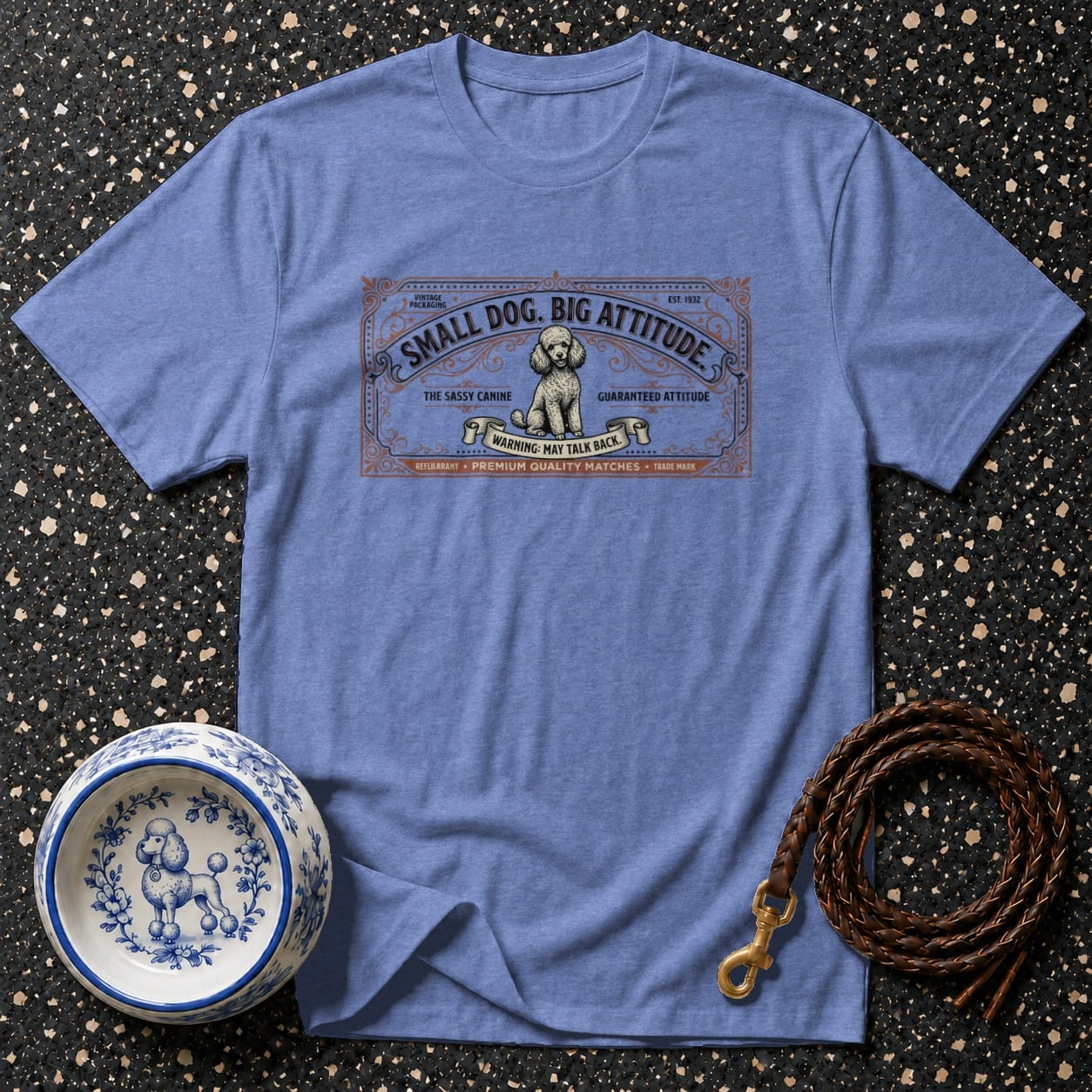 Blue t-shirt with "Small Dog. Big Attitude." vintage label featuring a poodle.
