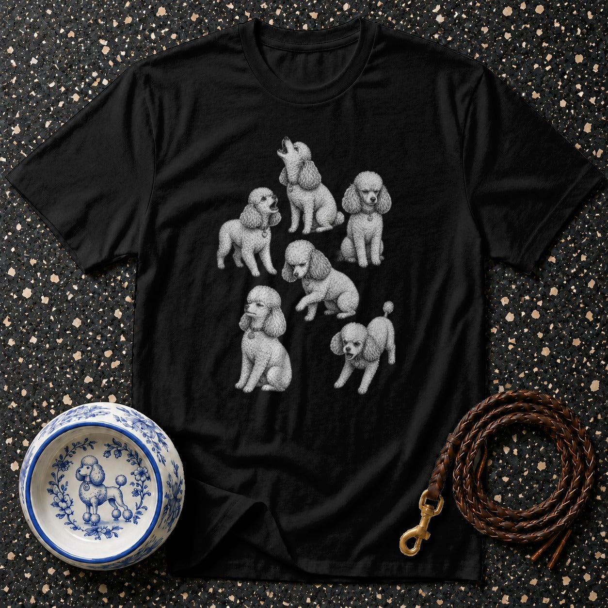 Black t-shirt with a charcoal sketch of six poodles in various poses.