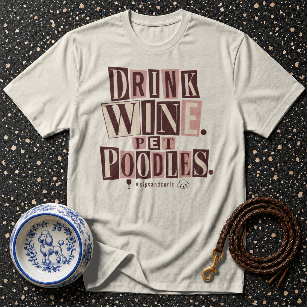 T-shirt with "DRINK WINE PET POODLES" text, wine glass, and poodle icons.