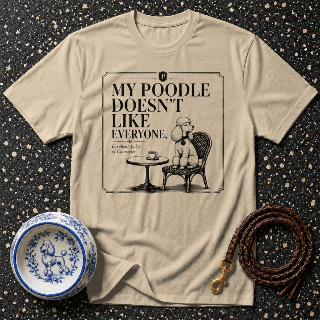 Tan t-shirt with "My Poodle Doesn't Like Everyone" text and poodle graphic.
