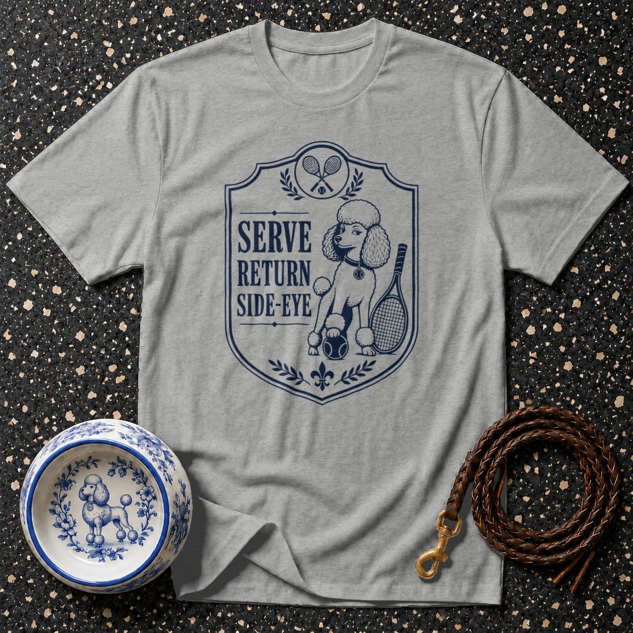 Gray t-shirt with blue poodle tennis graphic and text that reads "SERVE RETURN SIDE-EYE".