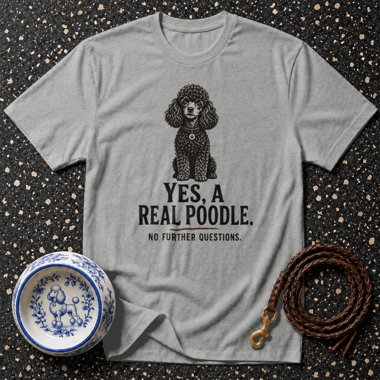 Grey t-shirt with poodle illustration and text: YES, A REAL POODLE.