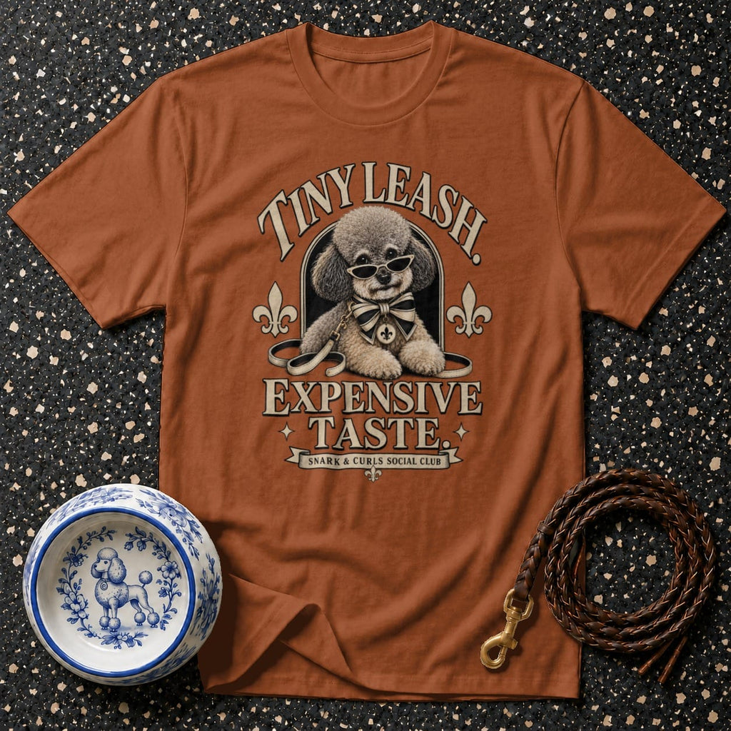 Brown t-shirt with graphic of poodle wearing sunglasses and bow tie, text "TINY LEASH EXPENSIVE TASTE".