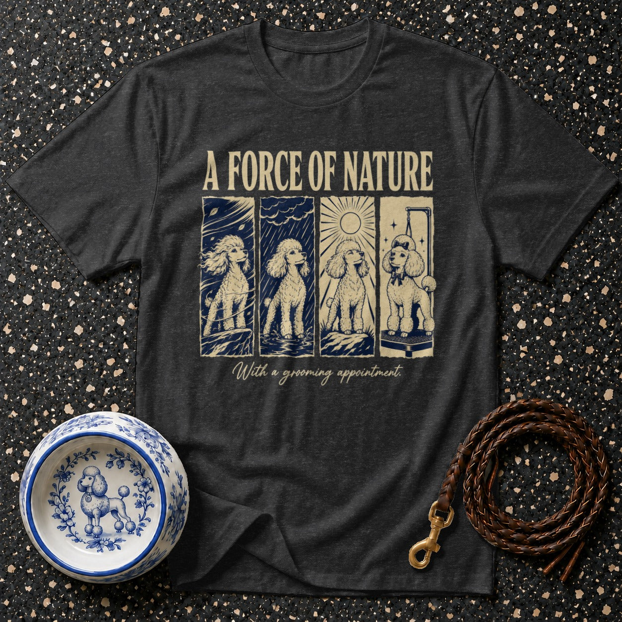 Dark t-shirt with four poodle illustrations and text "A FORCE OF NATURE With a grooming appointment".
