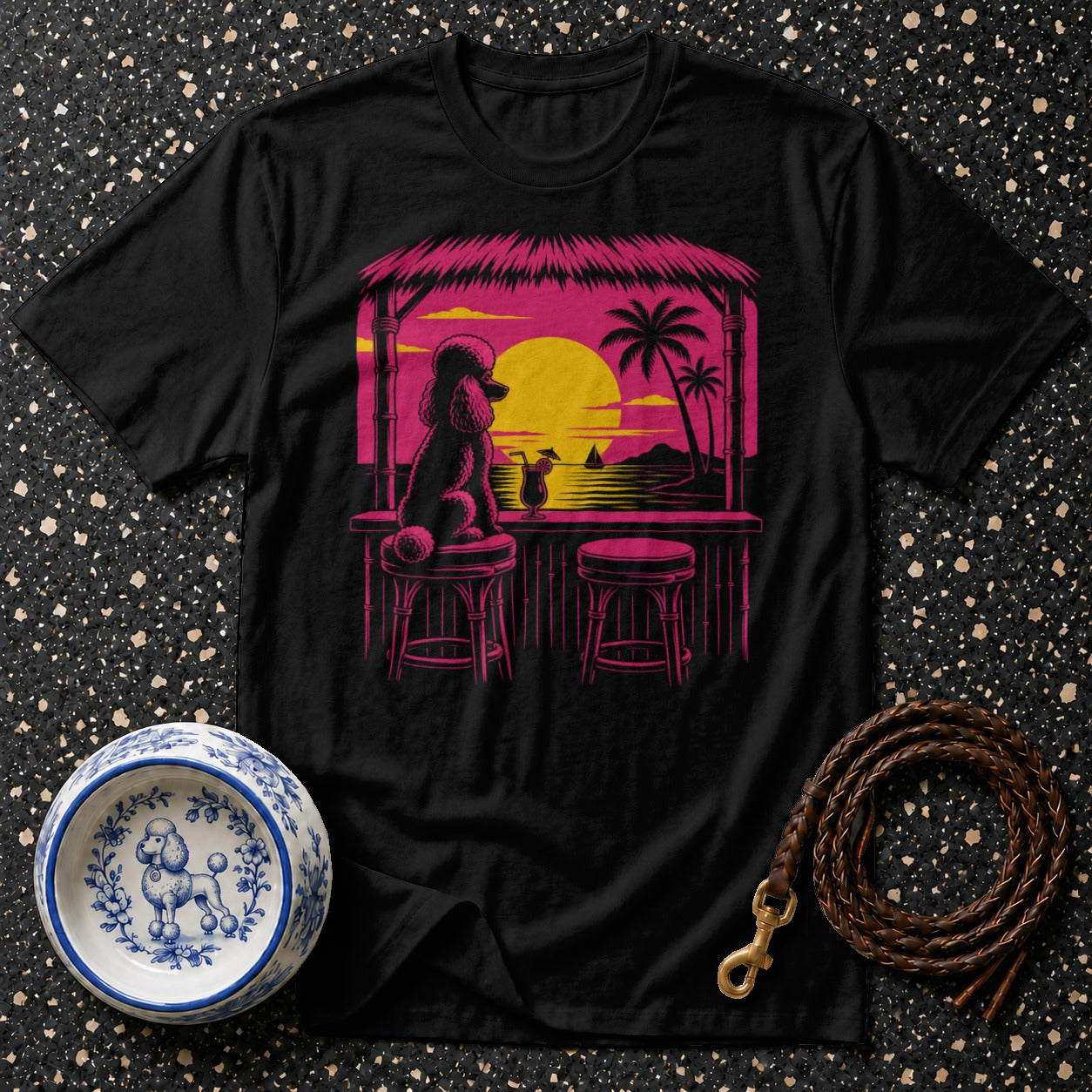 Black t-shirt with a poodle sitting at a bar during a tropical sunset.