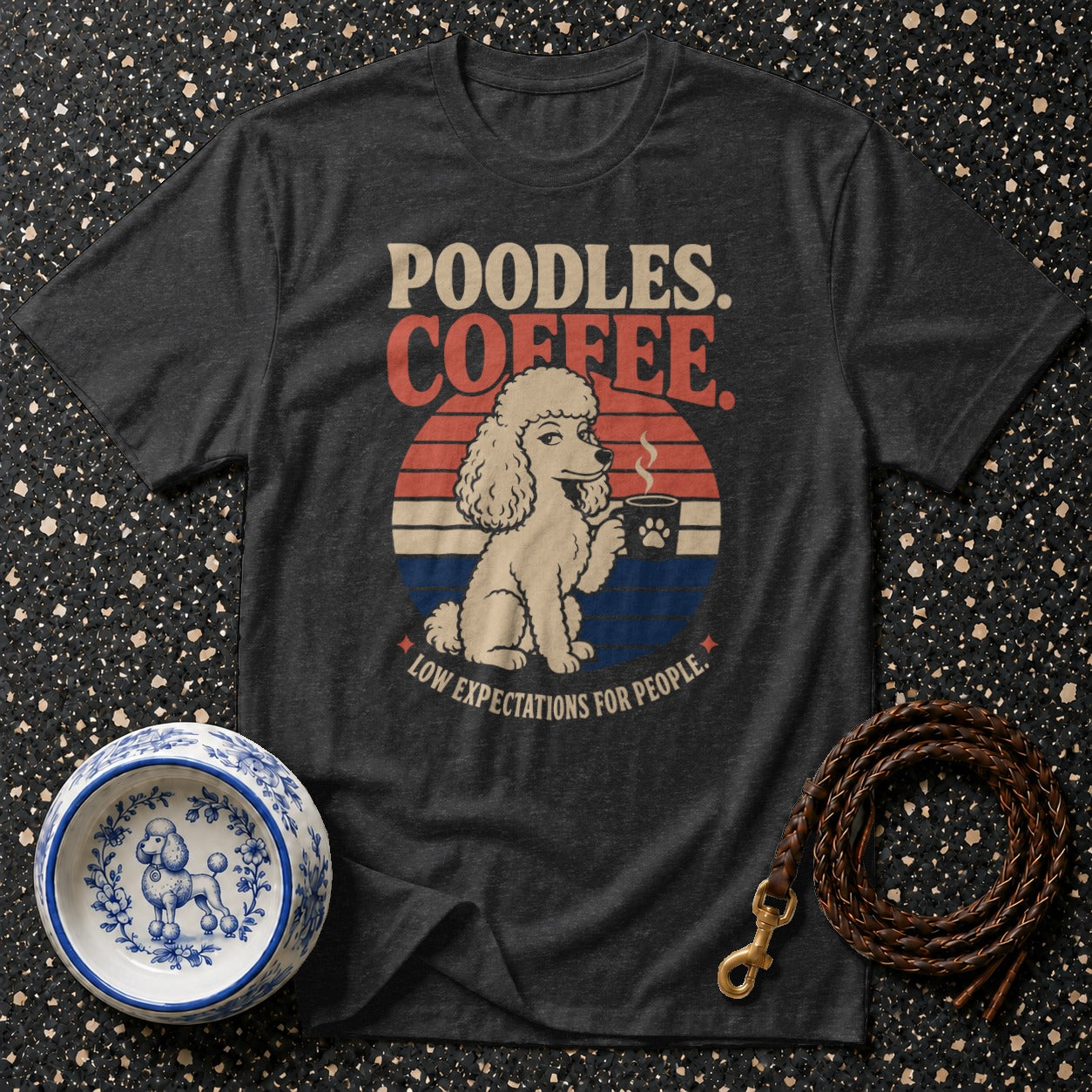 Dark t-shirt with a poodle holding coffee and text "Poodles. Coffee. Low expectations for people."