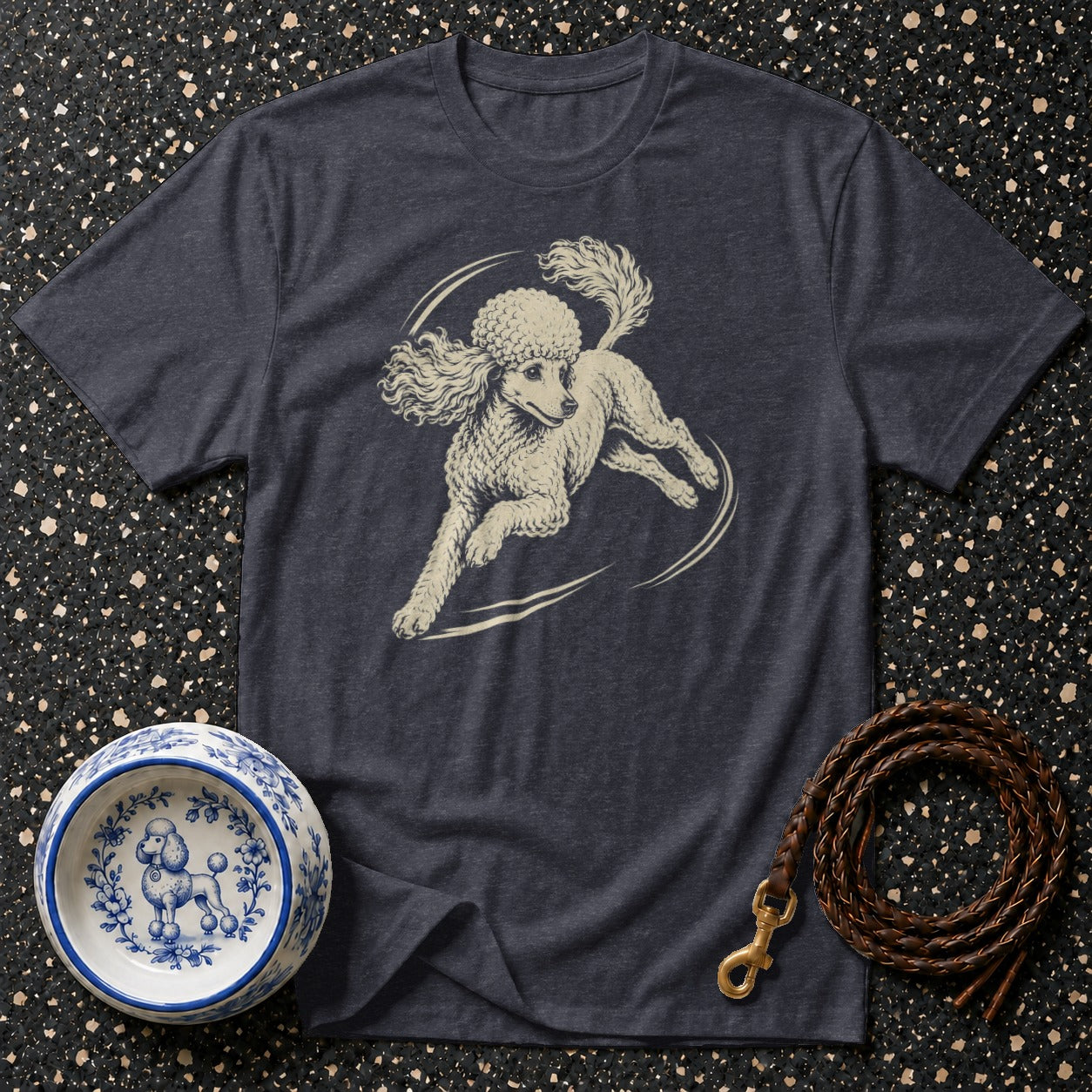 Dark t-shirt with cream poodle graphic, dog bowl, and braided leash.
