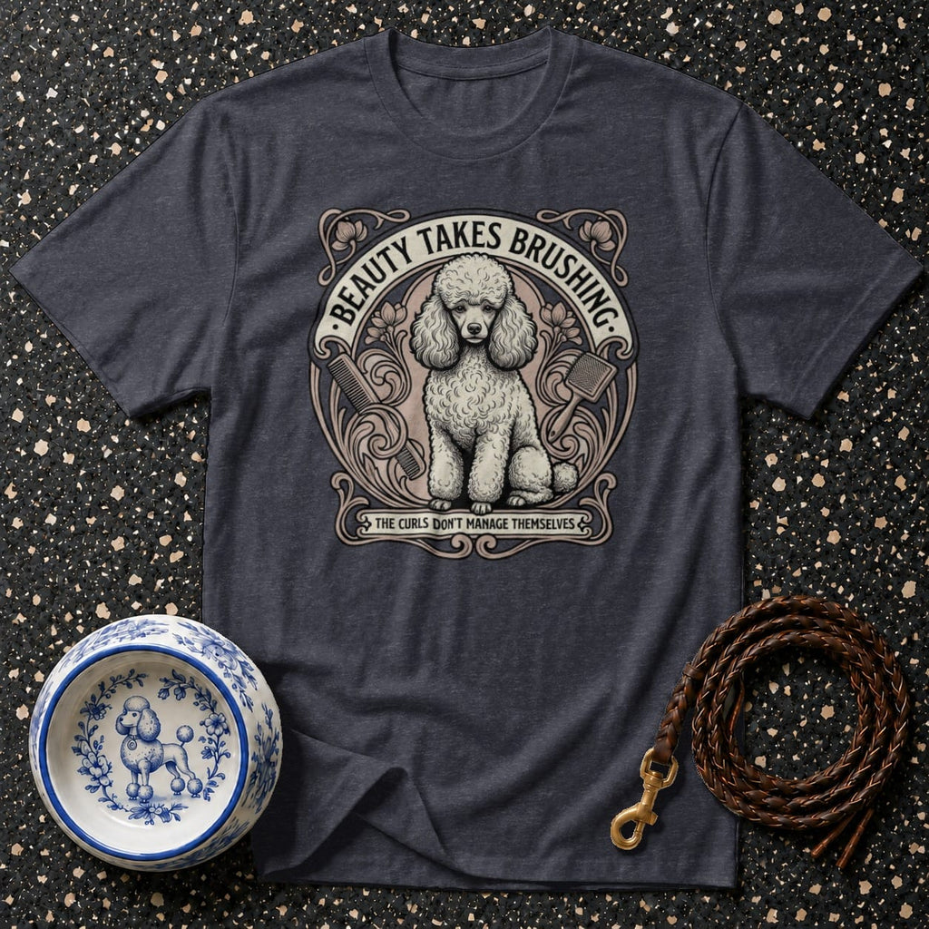 Poodle graphic t-shirt displaying "Beauty Takes Brushing" and "The Curls Don't Manage Themselves."