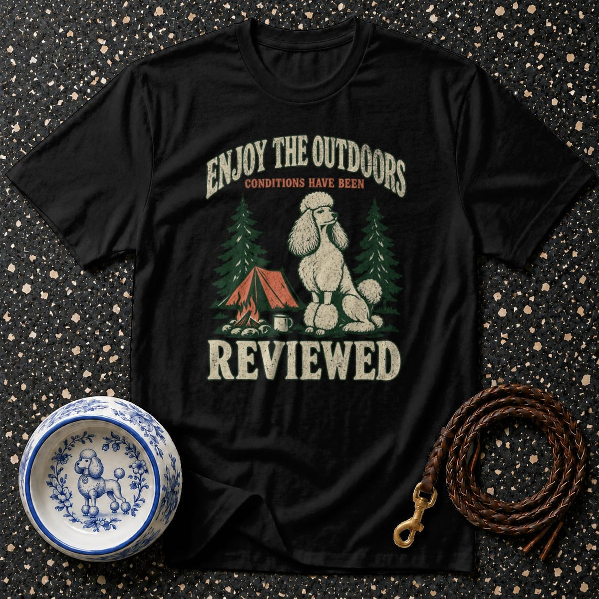 Black t-shirt with vintage camping graphic and poodle, reads "Enjoy the Outdoors".