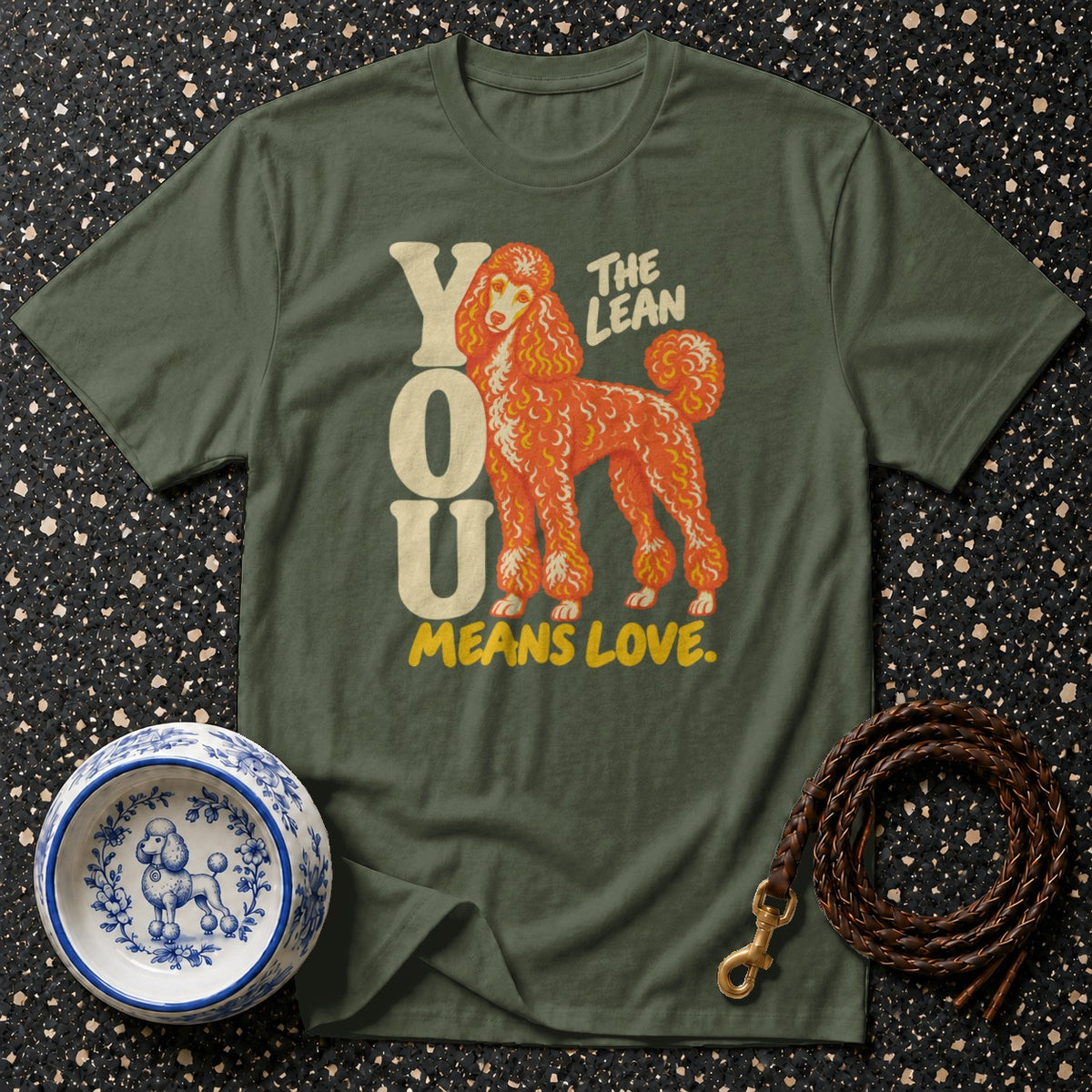 Olive green t-shirt with a poodle graphic and text "YOU MEANS LOVE."