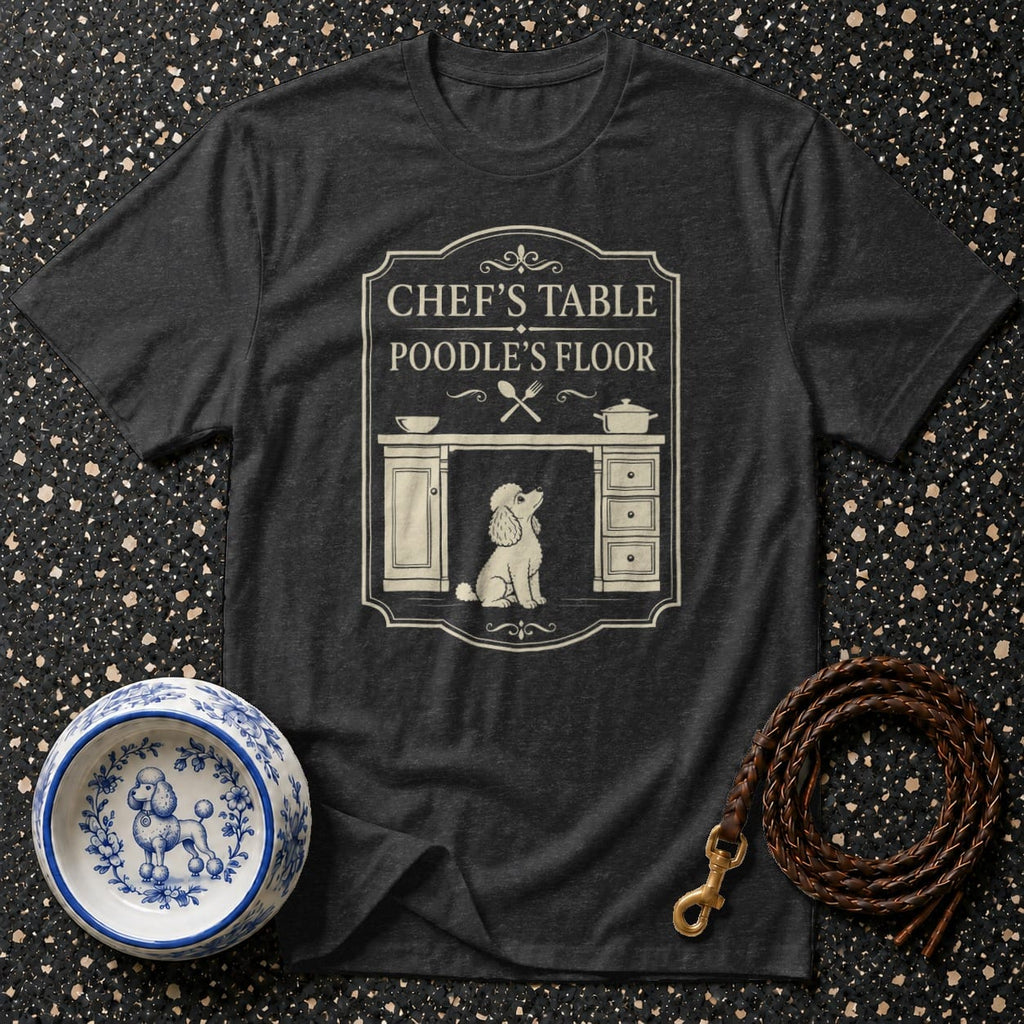 Dark t-shirt with text "Chef's Table Poodle's Floor" and a poodle graphic.