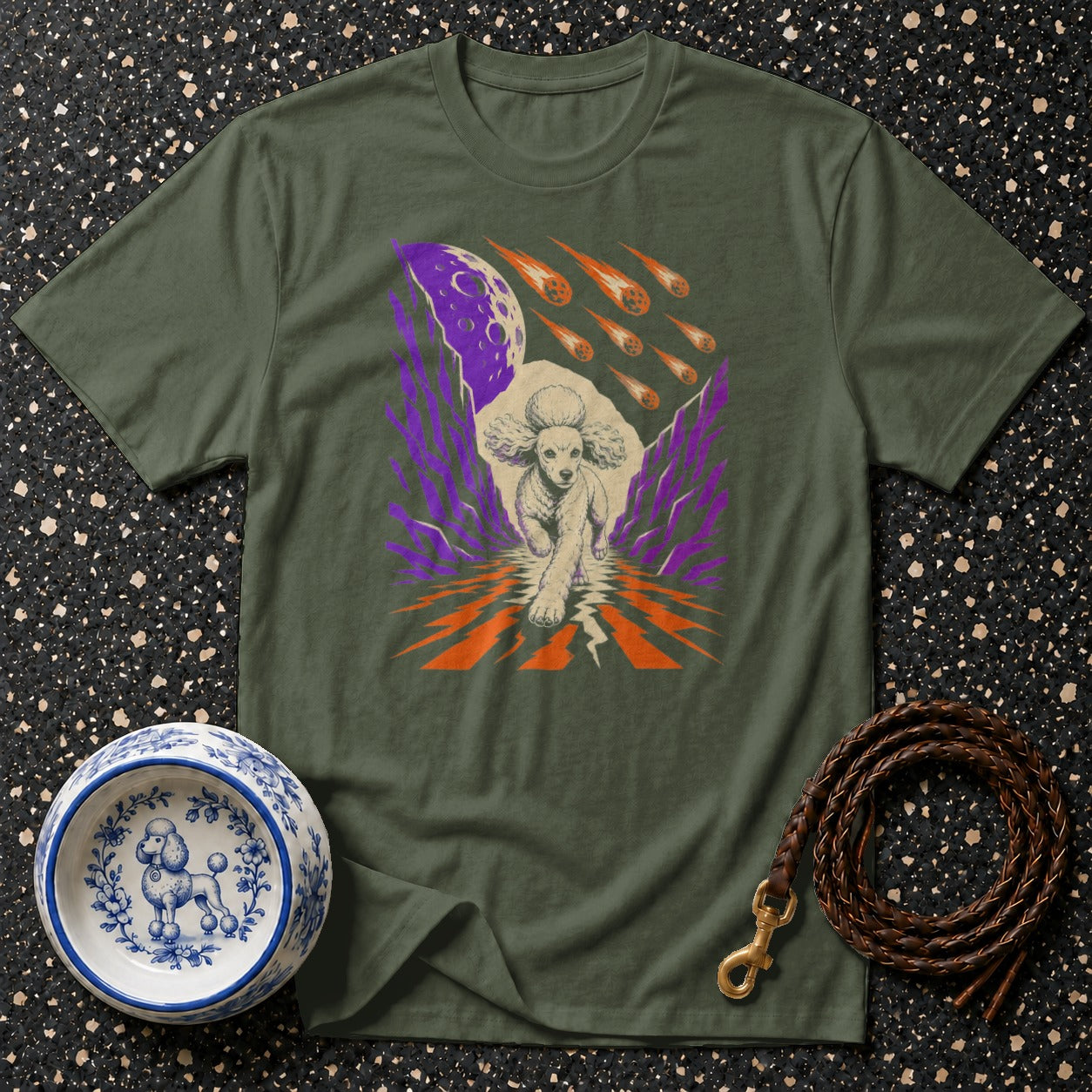 Green t-shirt with graphic of a poodle running through a meteor shower.