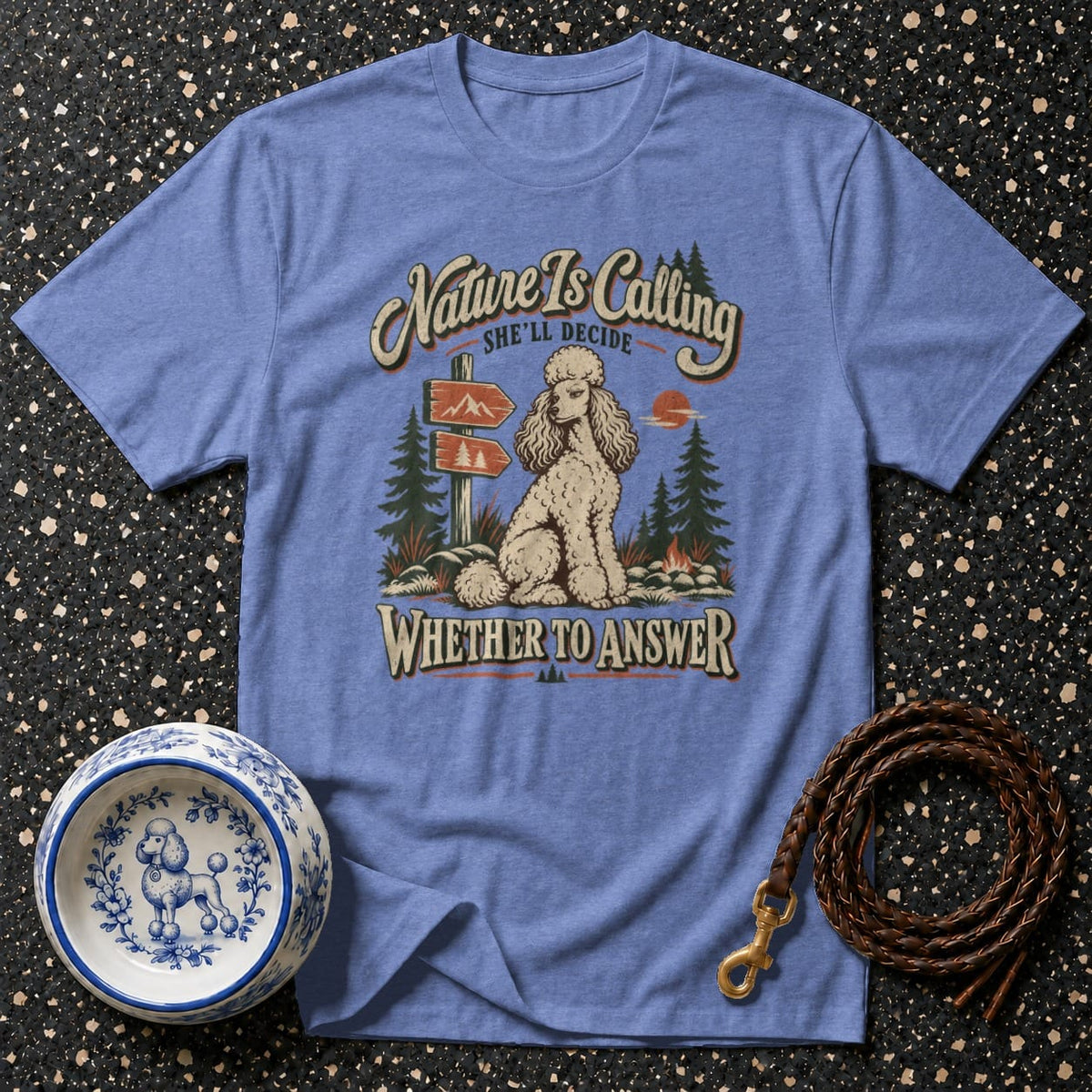 T-shirt with poodle graphic and text "Nature Is Calling".