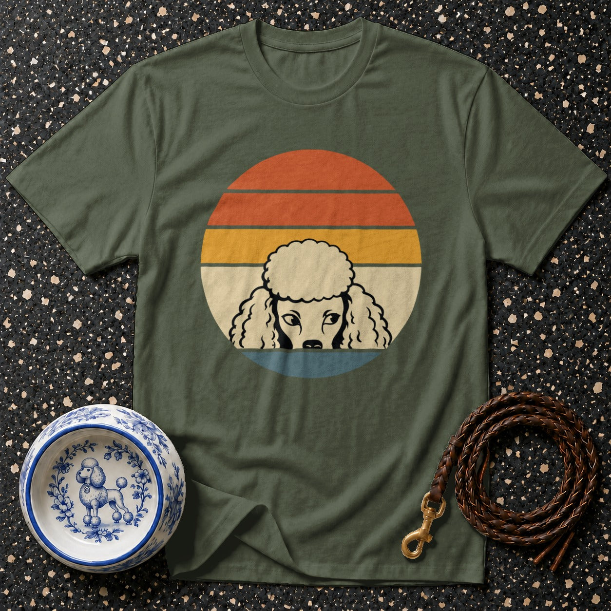 Green t-shirt with vintage poodle graphic, dog bowl, and leash.