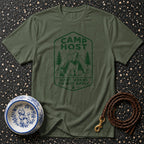 Green t-shirt with a camping scene and text "CAMP HOST QUIET HOURS DO NOT APPLY".