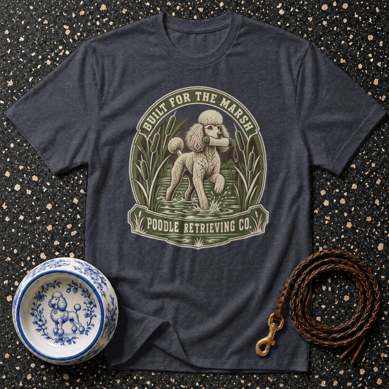 Dark t-shirt with a poodle retrieving in water graphic and text.