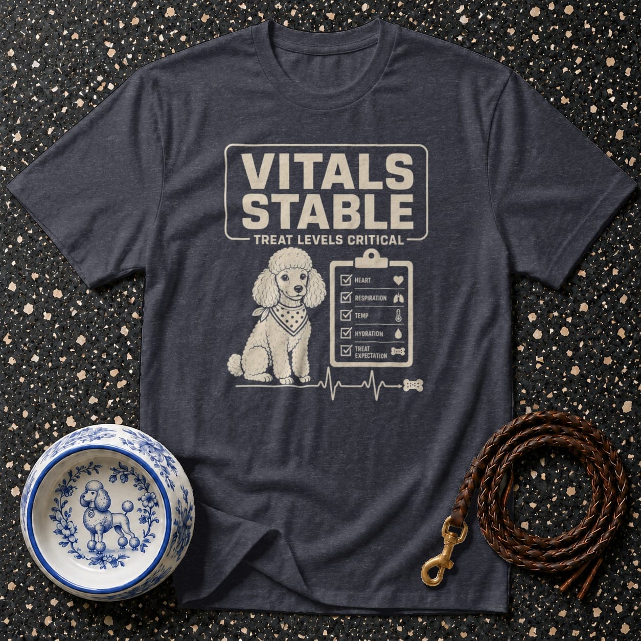 Dark t-shirt with graphic of a poodle and vitals checklist, "Vitals Stable Treat Levels Critical."