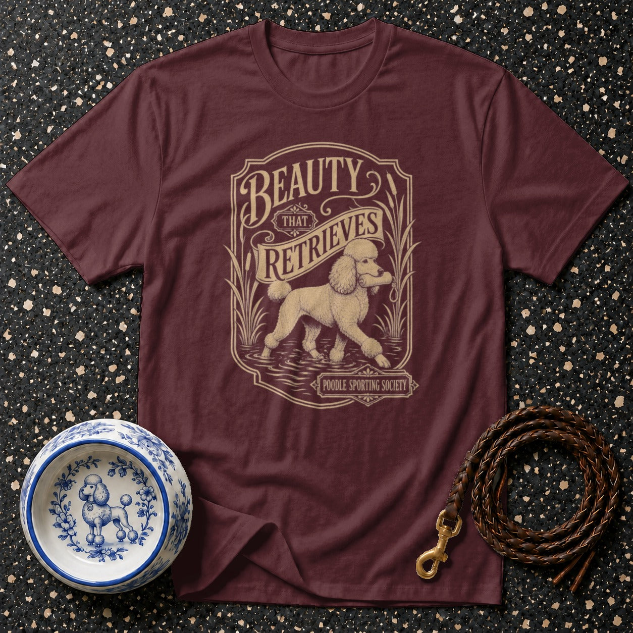 Maroon t-shirt with "Beauty That Retrieves" design featuring a poodle and "Poodle Sporting Society".