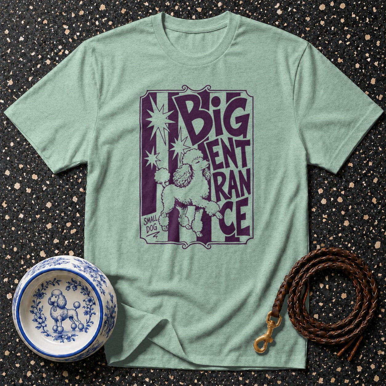 Light green t-shirt with purple graphic featuring a poodle and "BIG ENTRANCE".