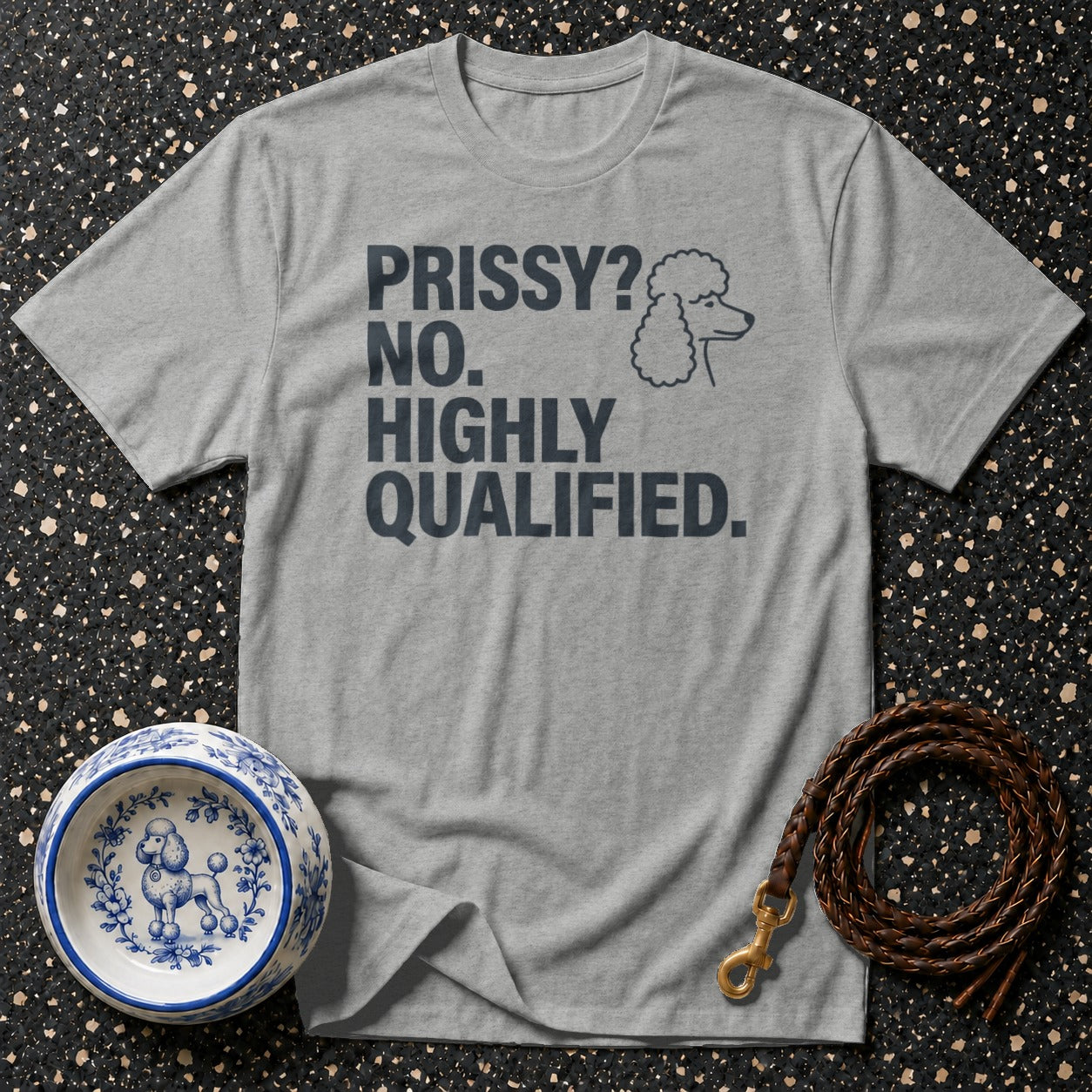Grey t-shirt with text "PRISSY? NO. HIGHLY QUALIFIED." and a poodle silhouette.