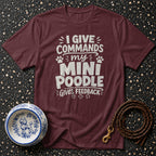 Maroon t-shirt with "I Give Commands My Mini Poodle Gives Feedback" text.