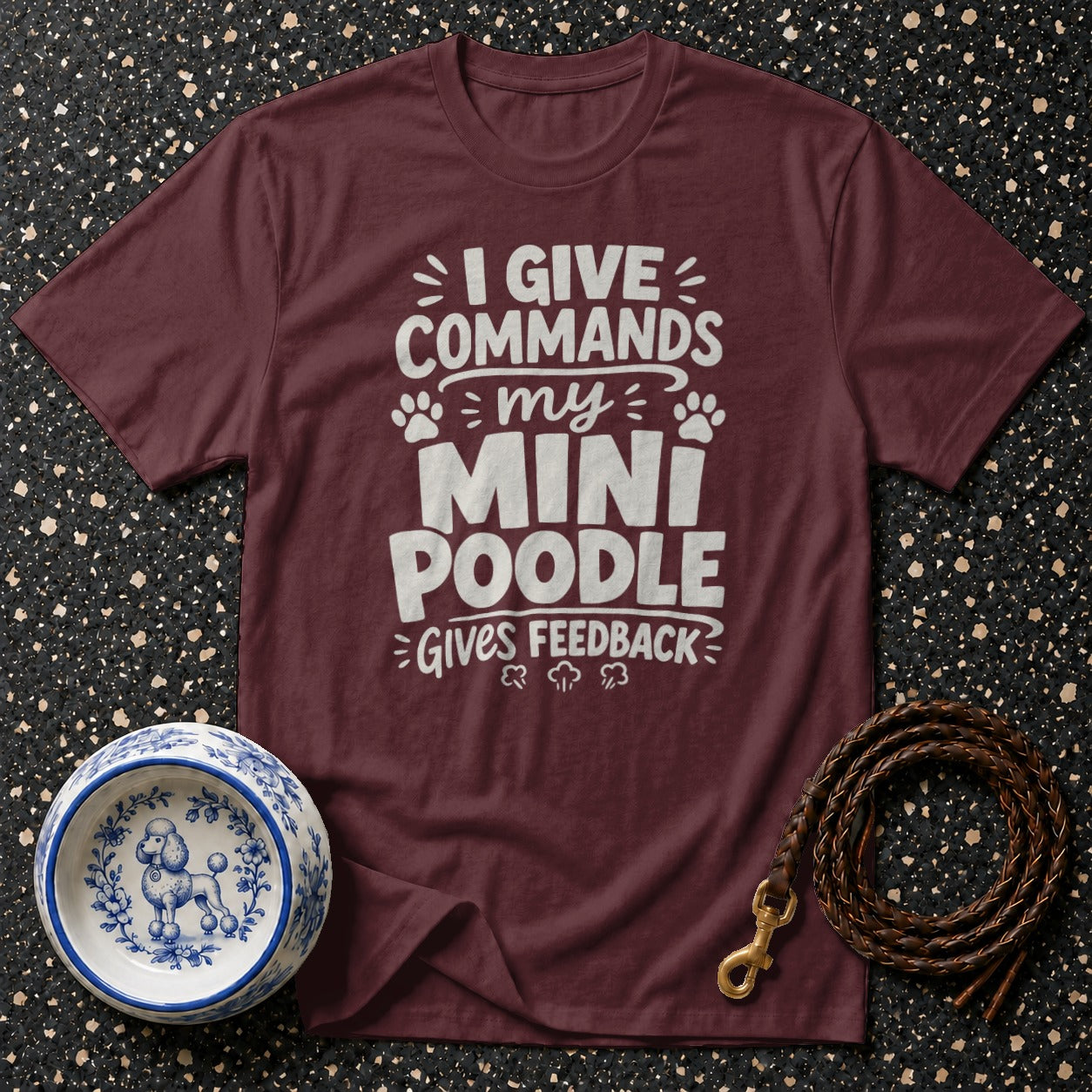 Maroon t-shirt with "I Give Commands My Mini Poodle Gives Feedback" text.