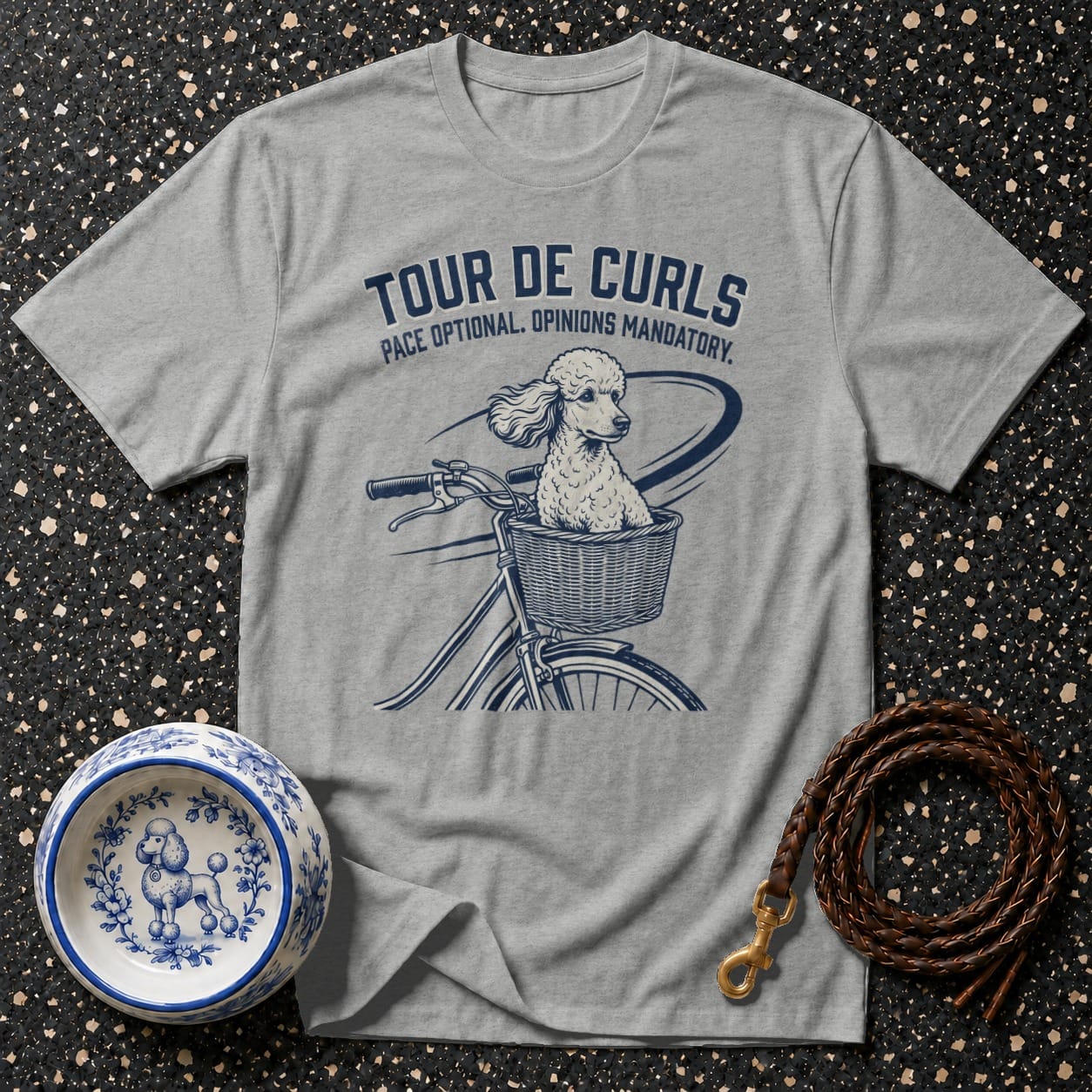 Grey t-shirt with graphic of poodle in bicycle basket, text Tour de Curls Pace Optional Opinions Mandatory.